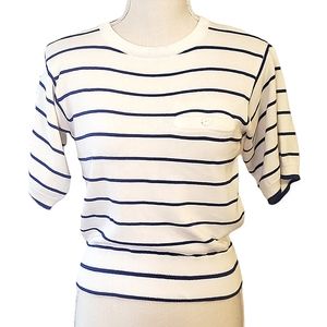 PS ILLUSTRATIONS | Women's white and blue striped knit short-sleeve sweater.